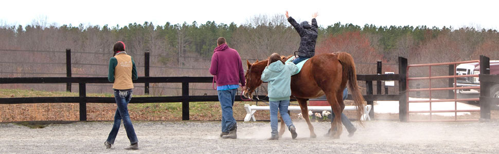 excited student on horseback