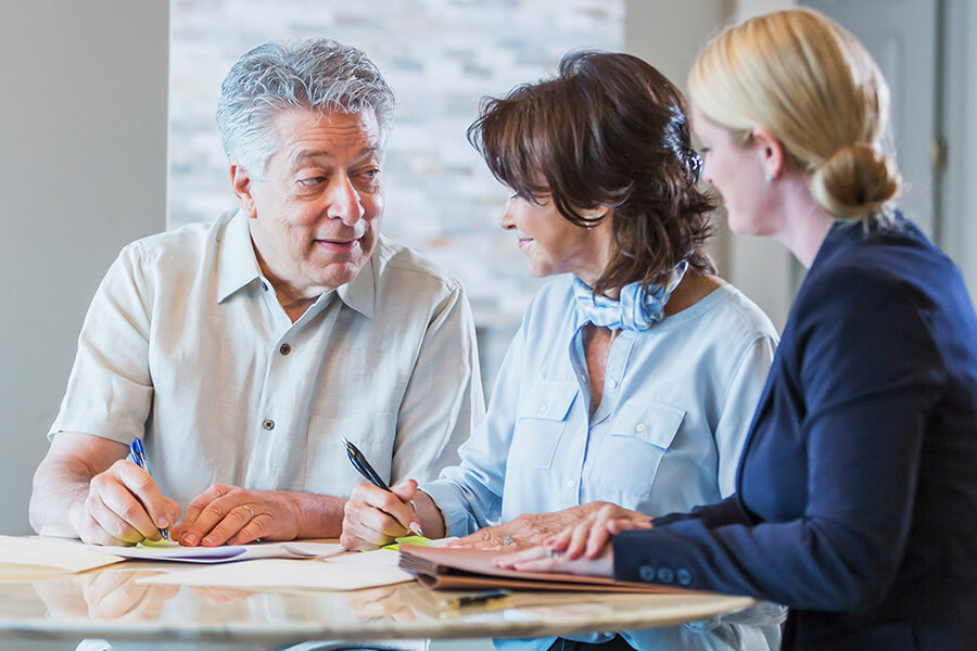 Estate planner talking to couple