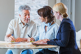 Estate planner talking to couple
