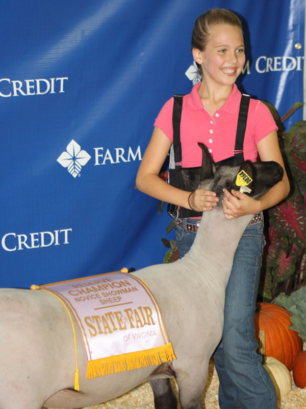 Young winner with sheep