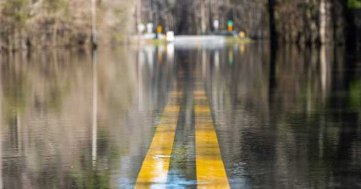Double yellow line on flooded road
