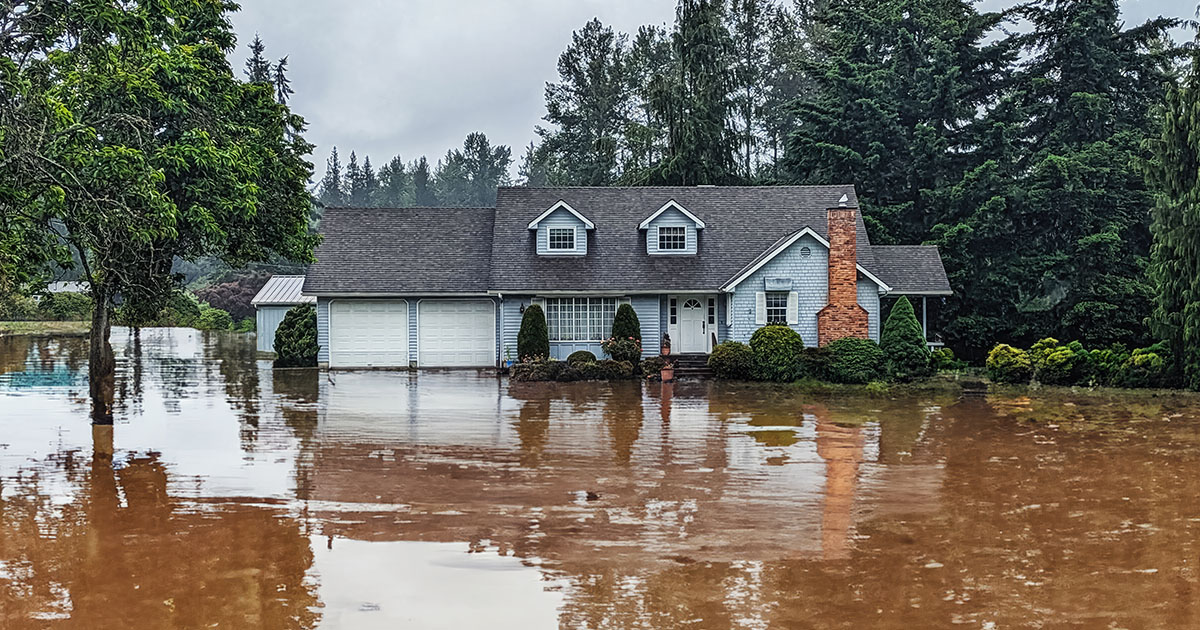 Home surrounded by flood water