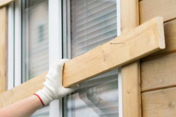 Homeowner boarding windows